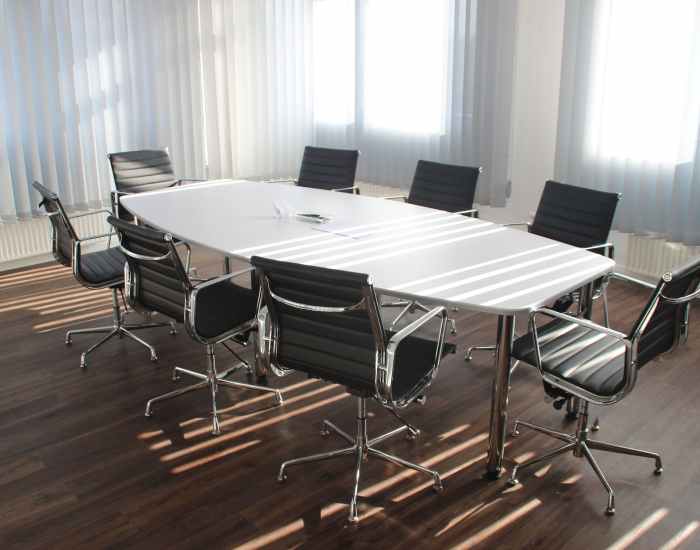 white wooden table with chairs set